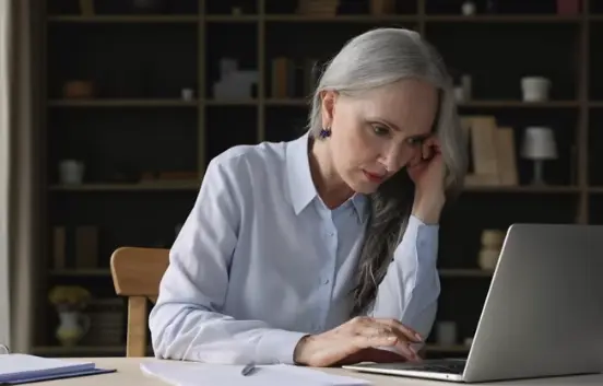 Professional woman experiencing focus issues